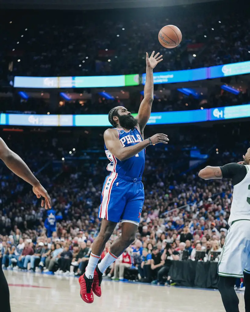 Austin Reaves jumps for a dunk in a game, May 2023