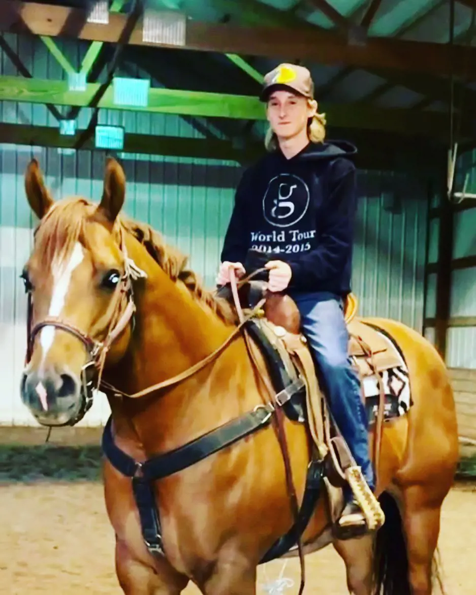 Dylan riding a horse while in Norman, Oklahoma, November 2021