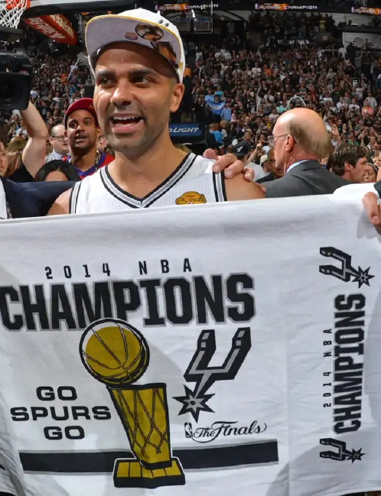 Tony Parker waving the Spurs 2014 champion flag.