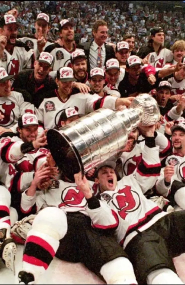 Detroit Red Wings team celebrating Stanley Cup championship in 1995.