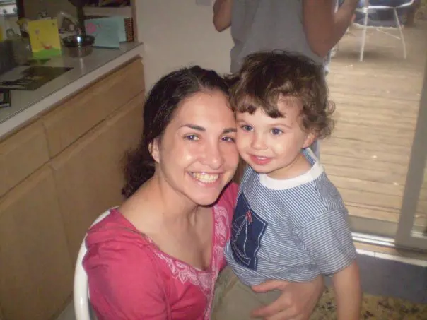 A kid Noah with Melissa in an old picture.