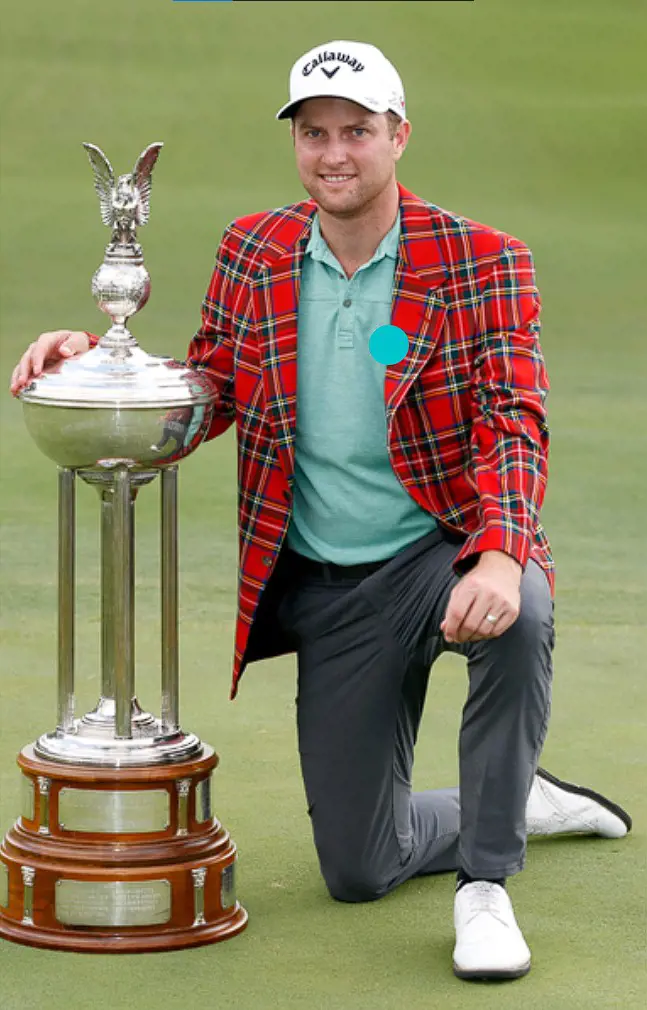 Krik posing with his Crowne Plaza Invitational trophy in 2016.