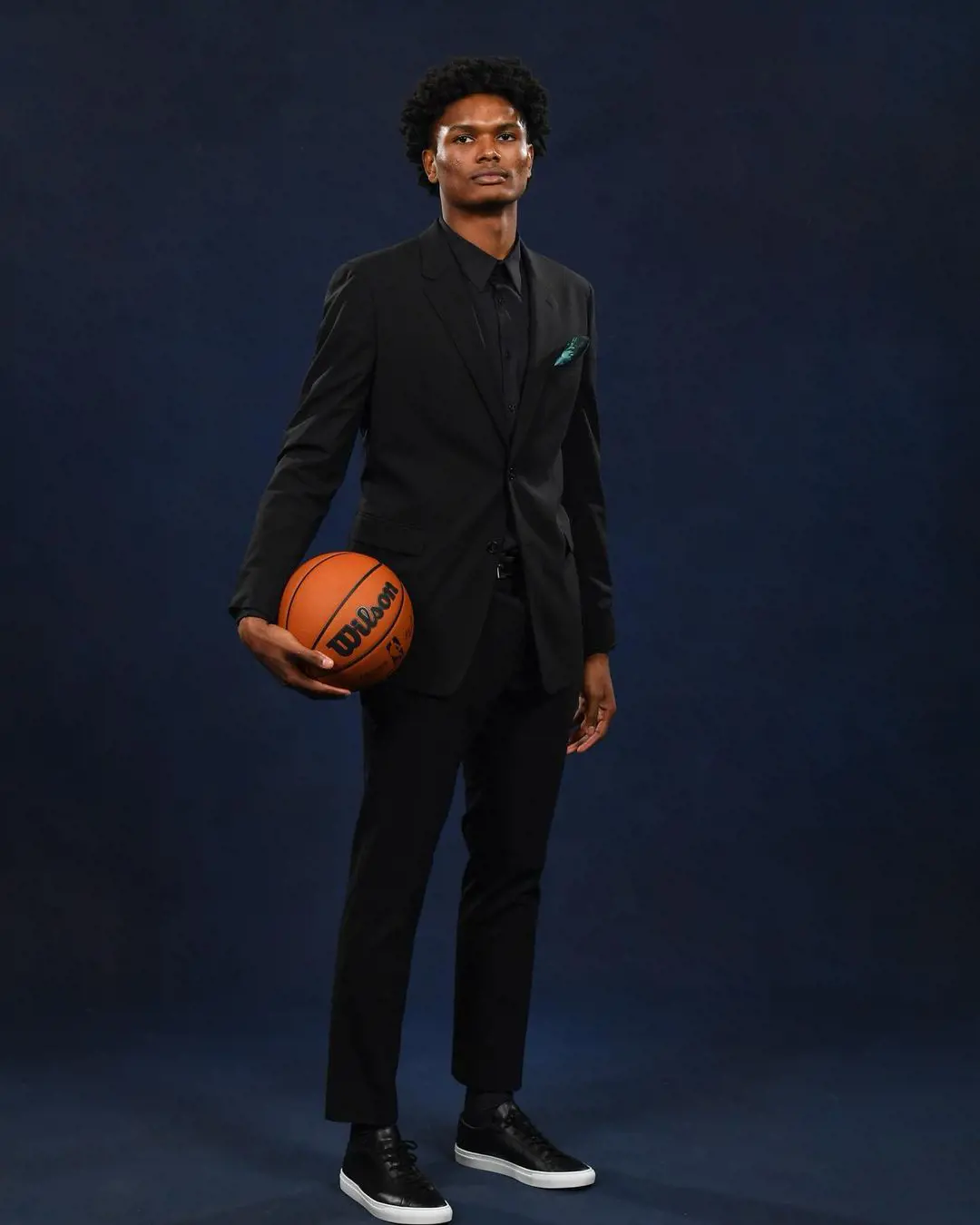 Amen with a basketball on hand during a photo session on May 18, 2023.