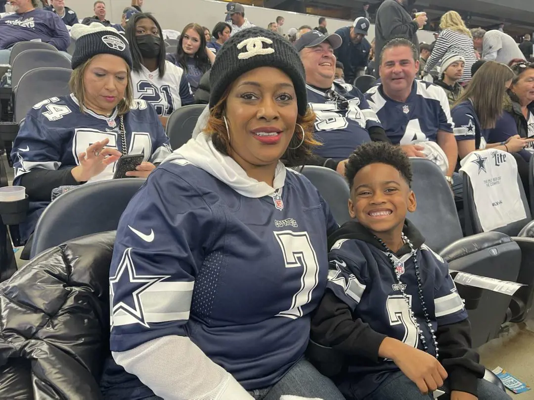 Stephanie and her grandson supporting Stefon during his game.