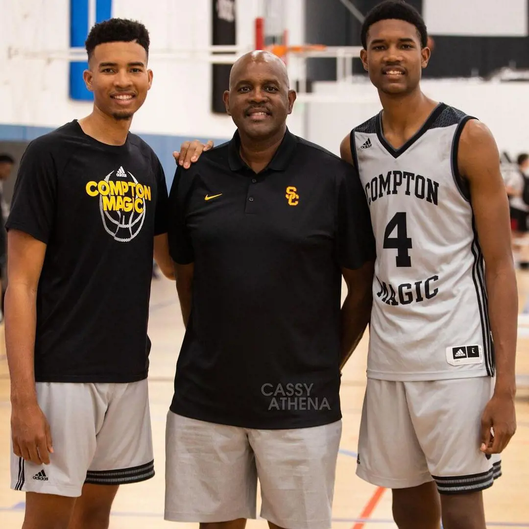 Isaiah(left) with his dad Eric and brother Evan at the basketball court.