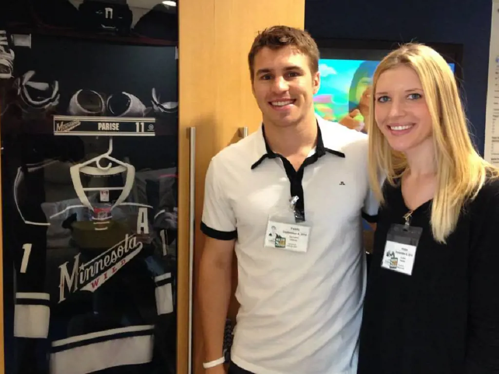 Zach and Alisha Woods stand next to the locker room at Children's – St. Paul in September 2014