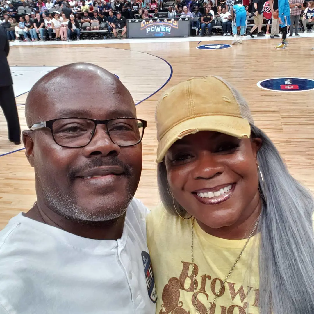 Earl supporting Sheryl during her game at American Airlines Center. 