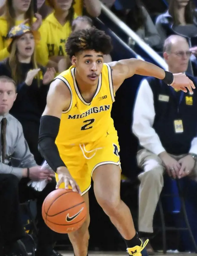 Jordan playing for Michigan Wolverine on his college days.