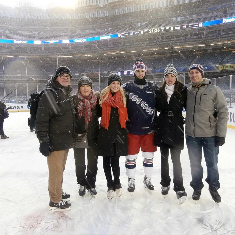 Derek with Pierre(left) and Suzanne during his NHL game in 2014.