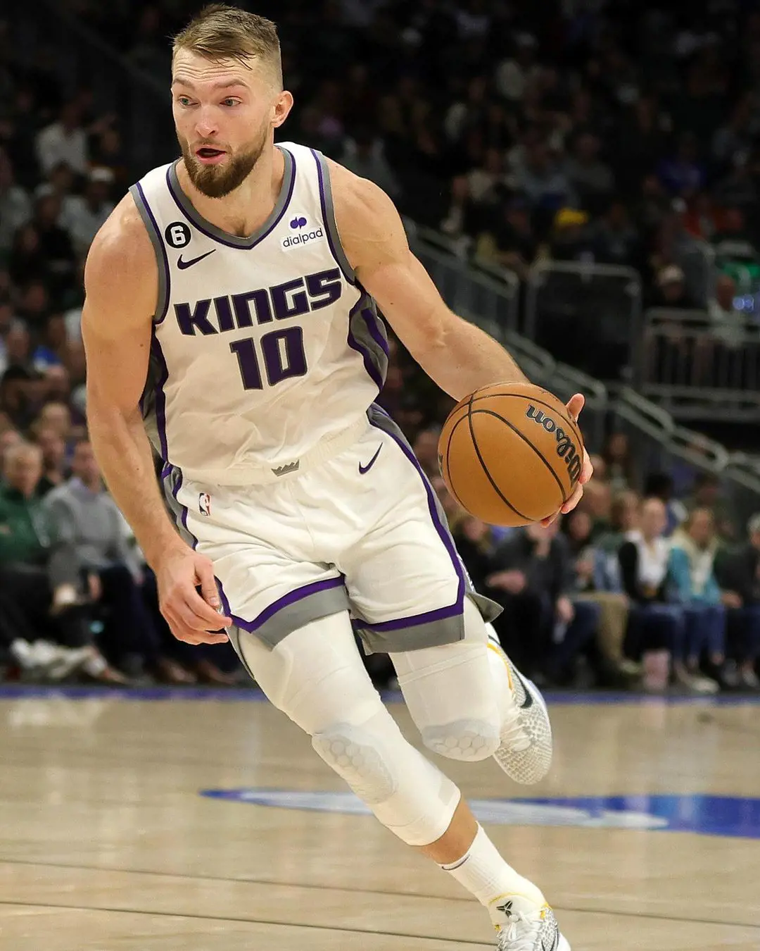 Domantas Sabonis on the Golden 1 Center court during a game of basketball.