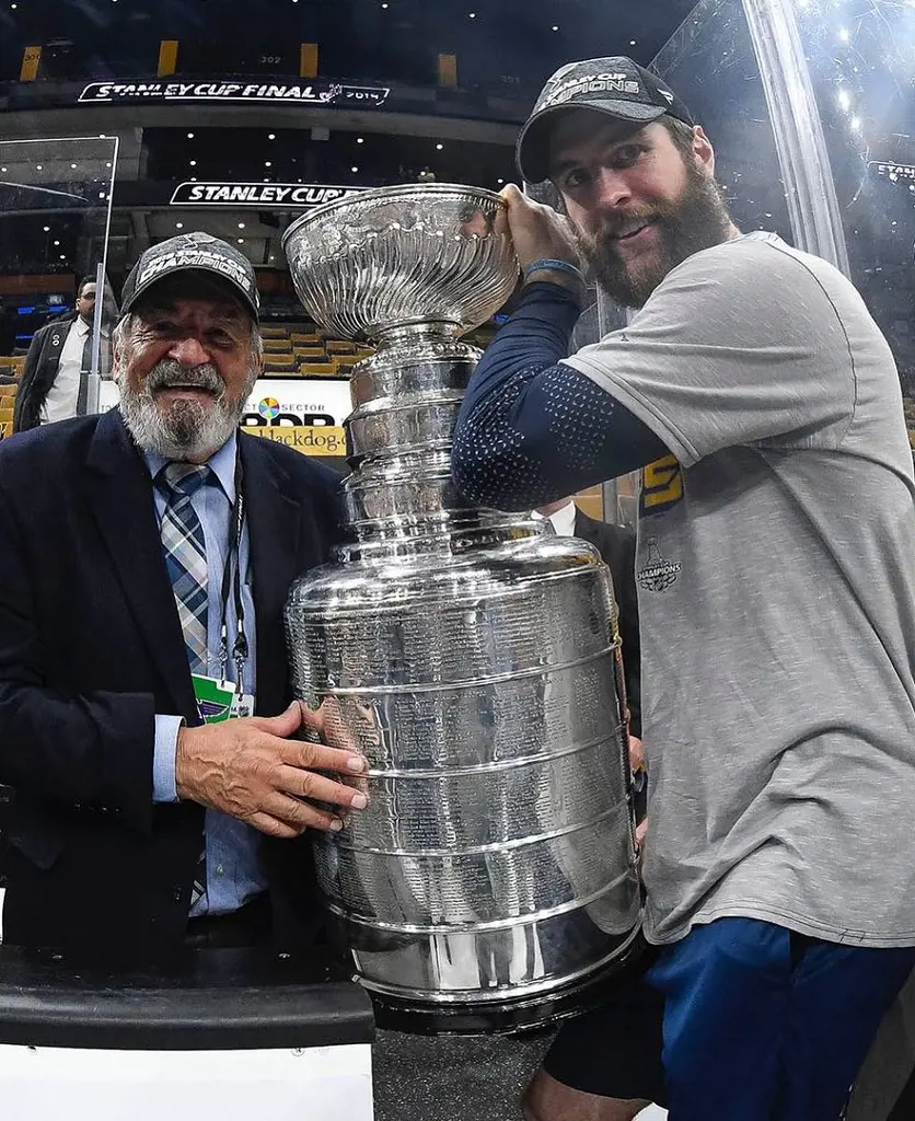 Alex with legendary NHL player Bobby Hall