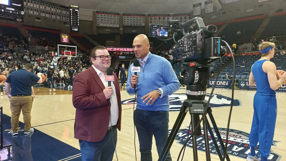 Marshall (right) with John Fanta at an Big East game in January 2023.