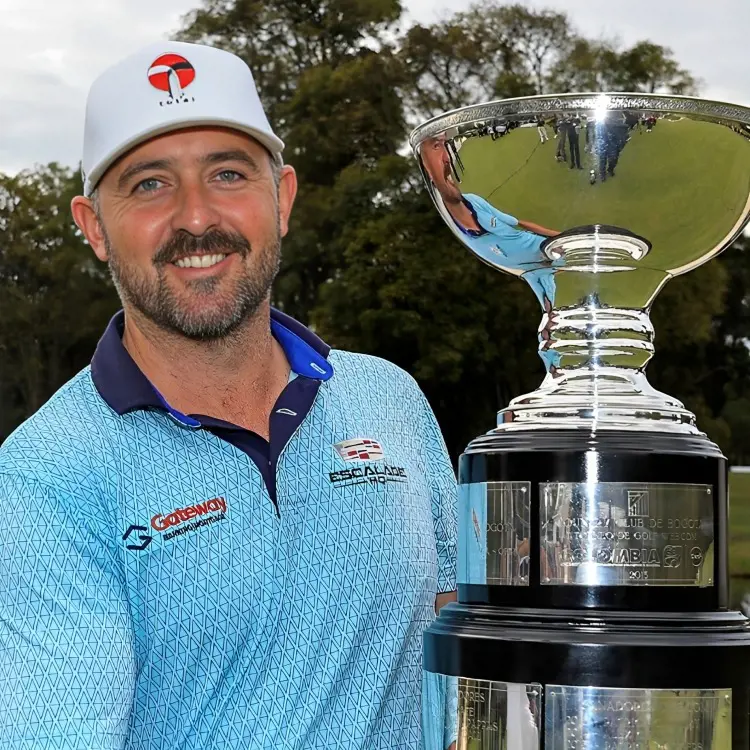 Gibson with the Astara Golf Championship trophy which he won in February