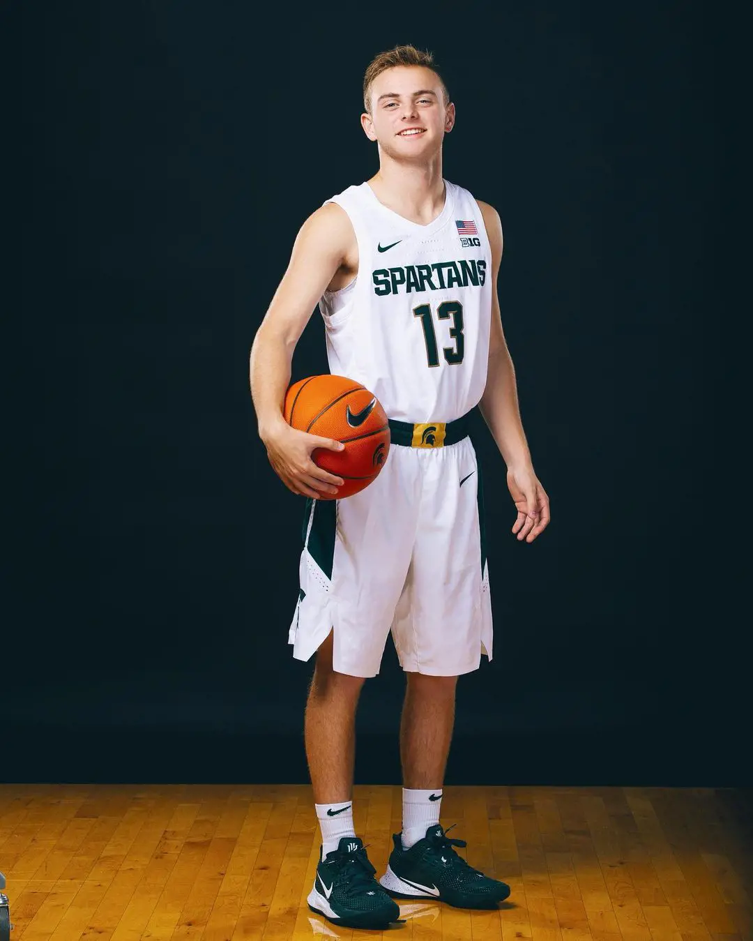 Steven proudly dons the Spartans jersey during the photoshoot event.