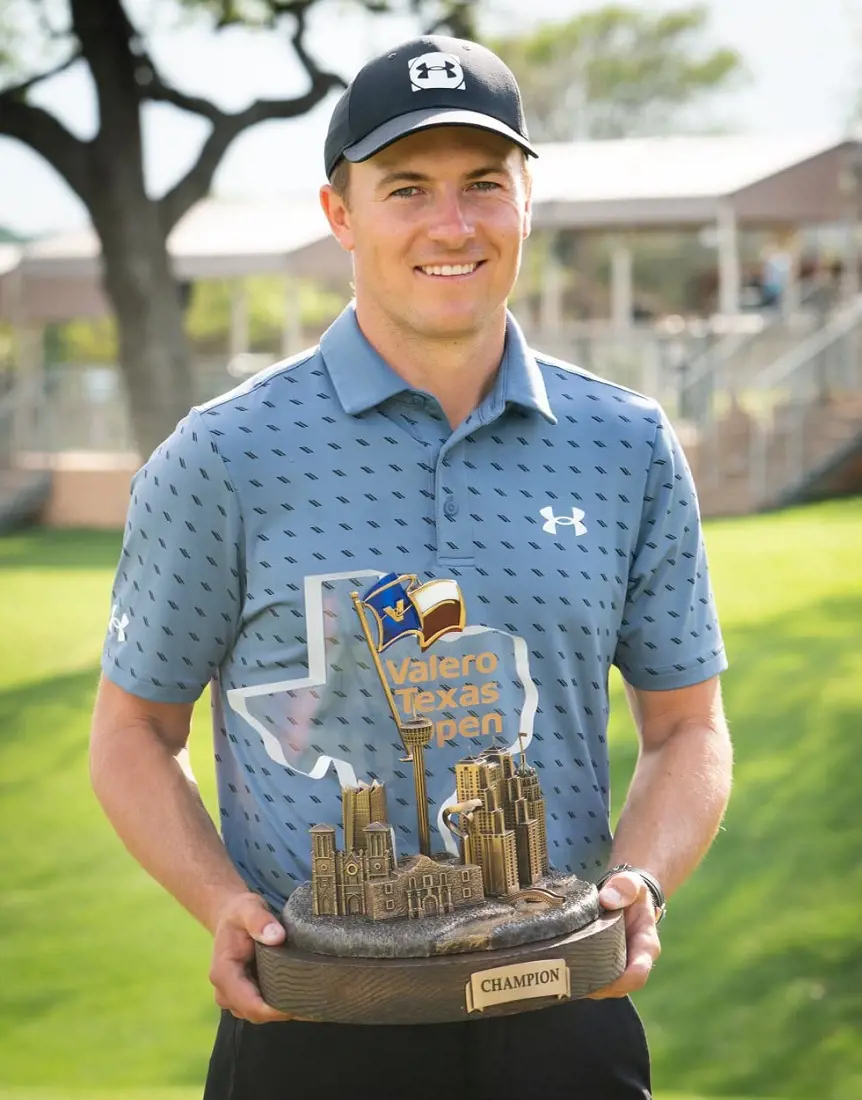 Jordan Spieth with the Valero Texas Open trophy in April 2021