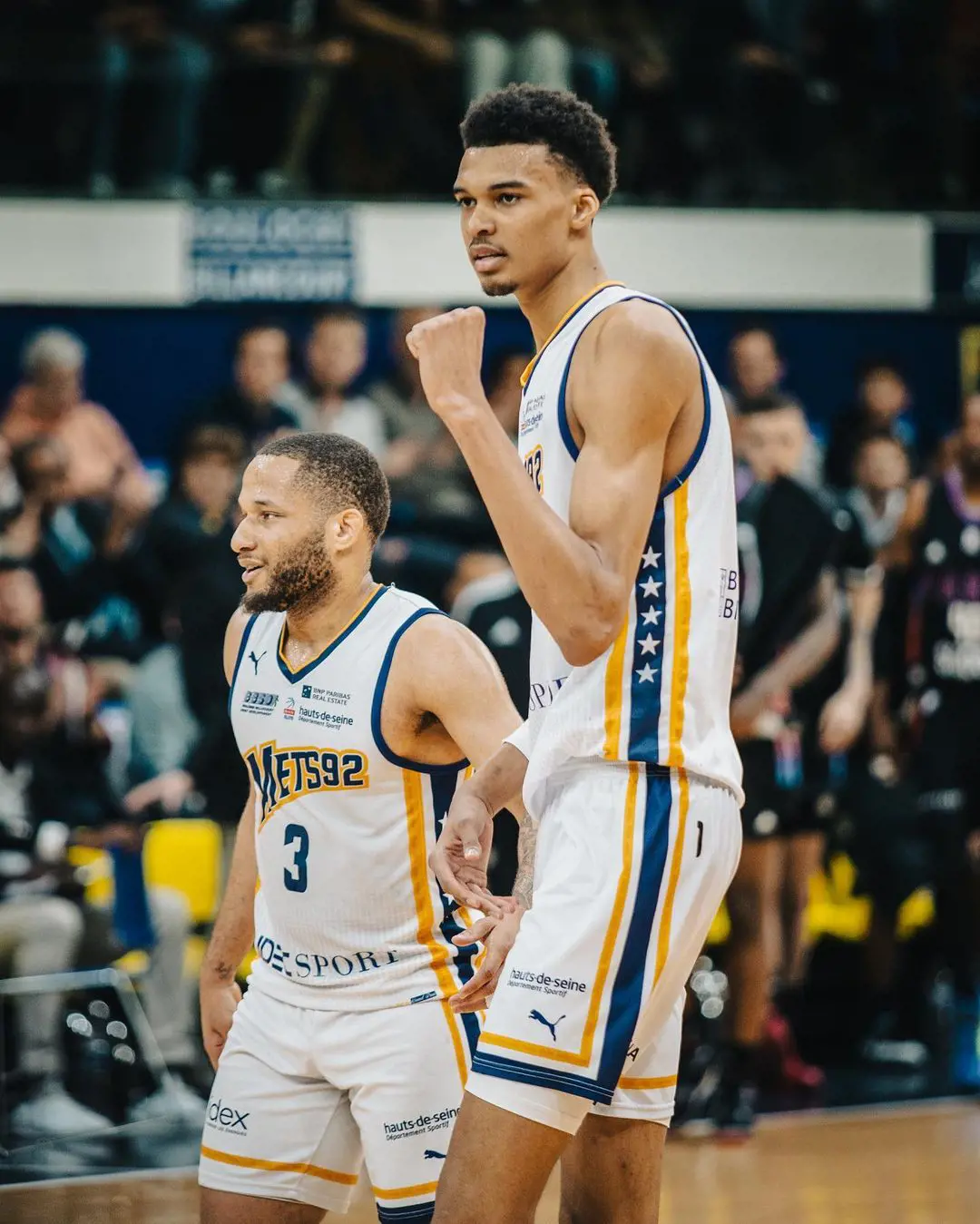 Victor celebrates with Devante Jones after advancing to the Playoffs.