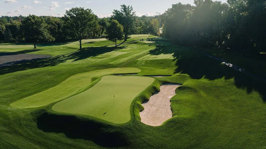 Oak Hill country club's symmetrical course depicted in the picture with the lushful nature