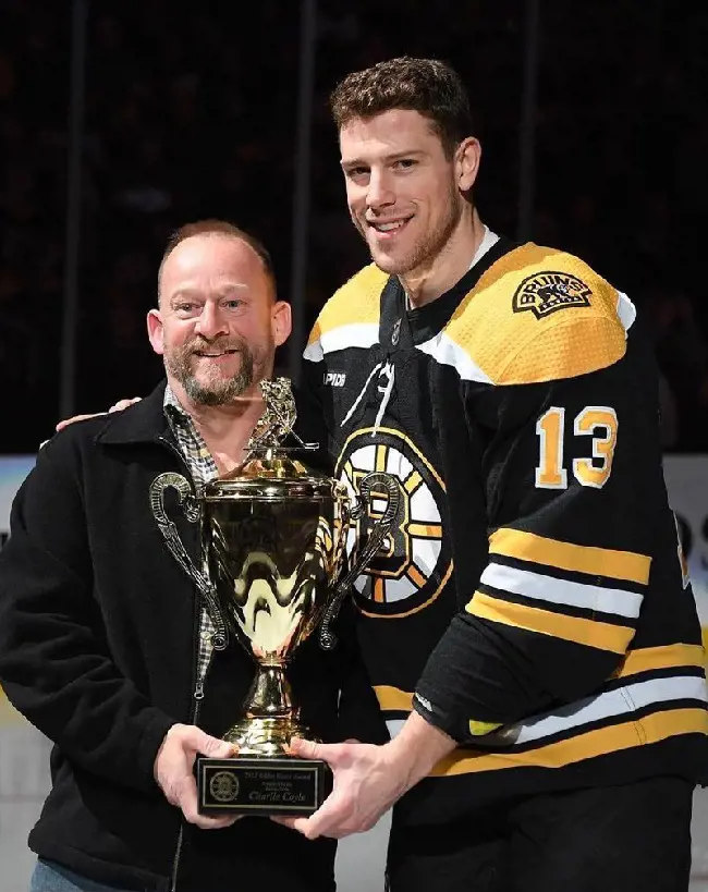 Coyle receiving NESN's 7th Player Award in March 2023.