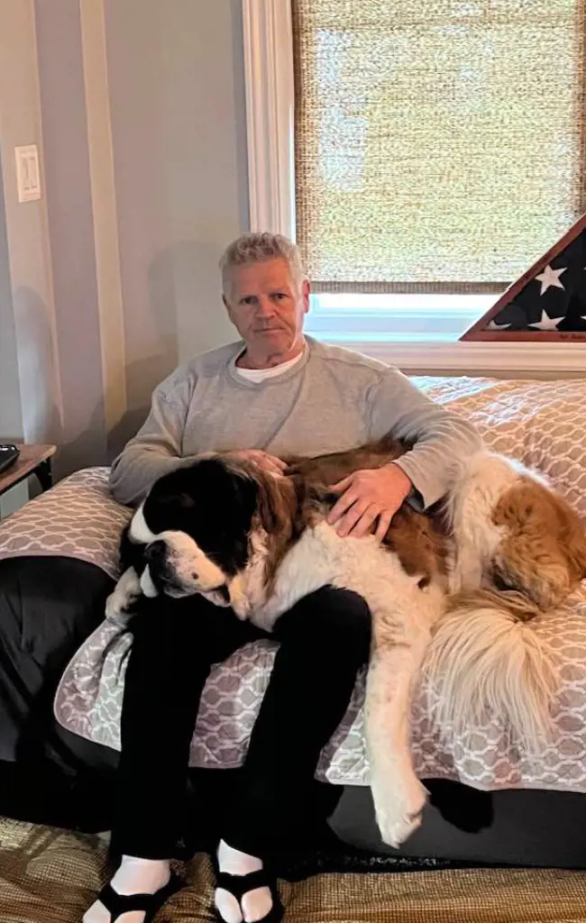 Chris Nilan with his pet dog in April 2023.