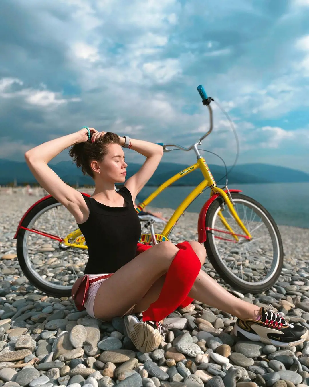 Rybakina sis Ann striking a pose with her cycle at near the embankment of the Olympic Park in November 2020