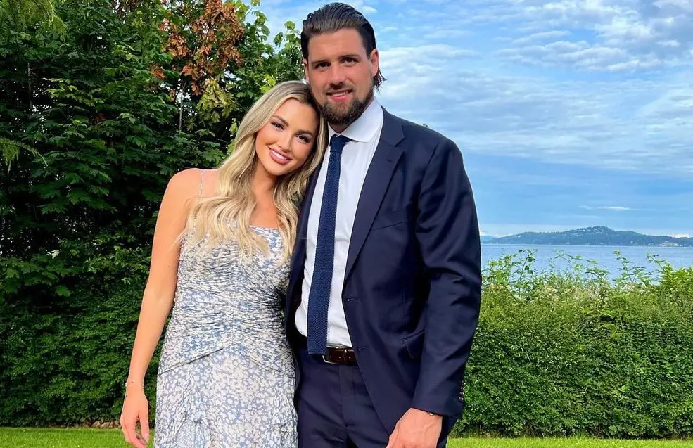 The couple in Victoria, British Columbia, attending Jenny Benny's wedding