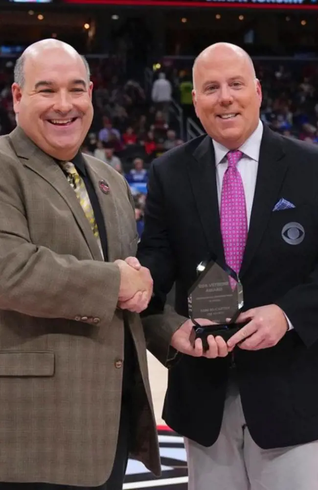 Tom(left) received the Bob Vetrone Award today at A10 Tournament on March 13, 2022.