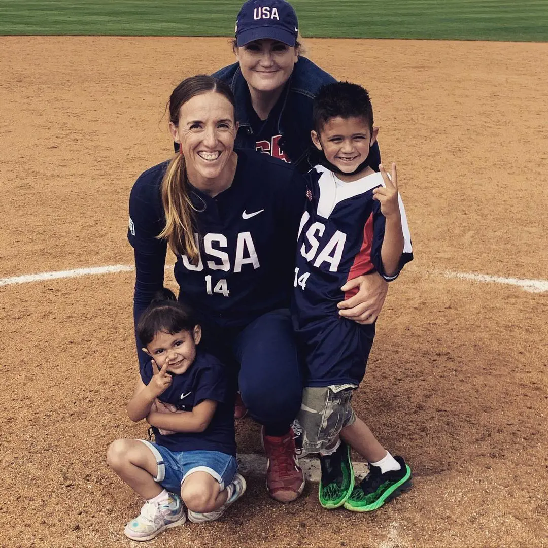 Jessica and her kids supporting Monica at her game in 2021. 