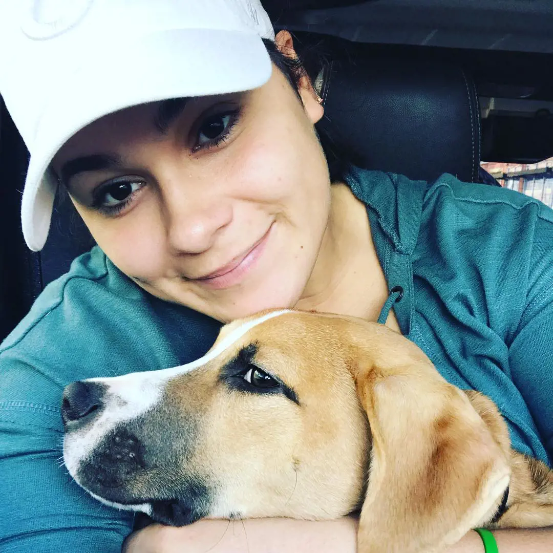 Paige takes her foster dog to get a booster shot in October 2018