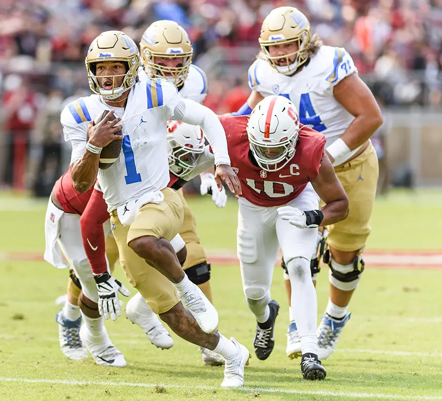 UCLA football redshirt senior QB Dorian Thompson-Robinson scrambles during a game