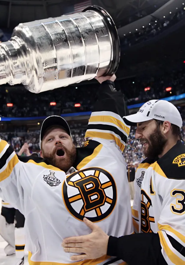 Tim Thomas roars while lifting the 2011 Championship.