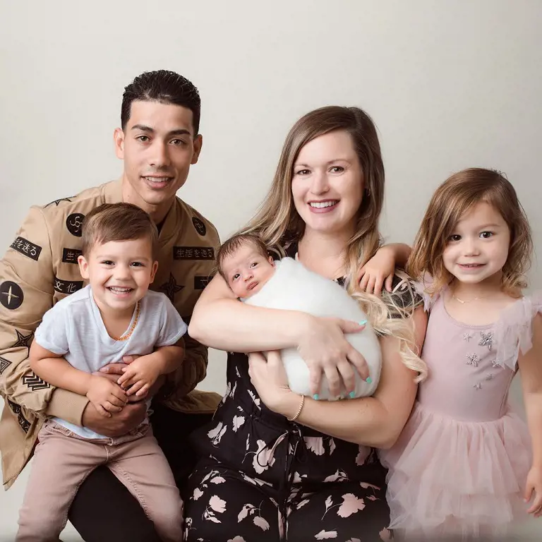 Jose Ortiz looking happy with Taylor and three kids. 