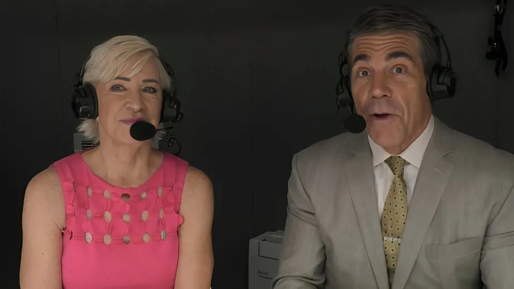 Chris Evert (left) and Chris Fowler (right) together during a broadcast