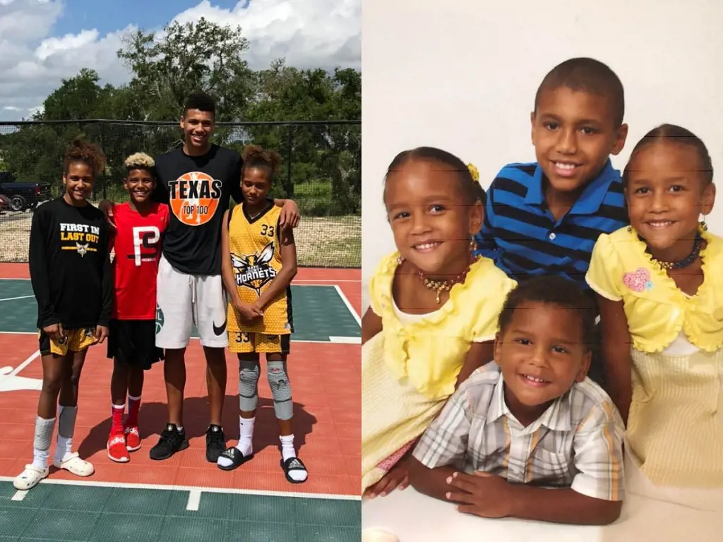 Dylan with his younger brother and twin sisters, who were playing basketball for Hornets