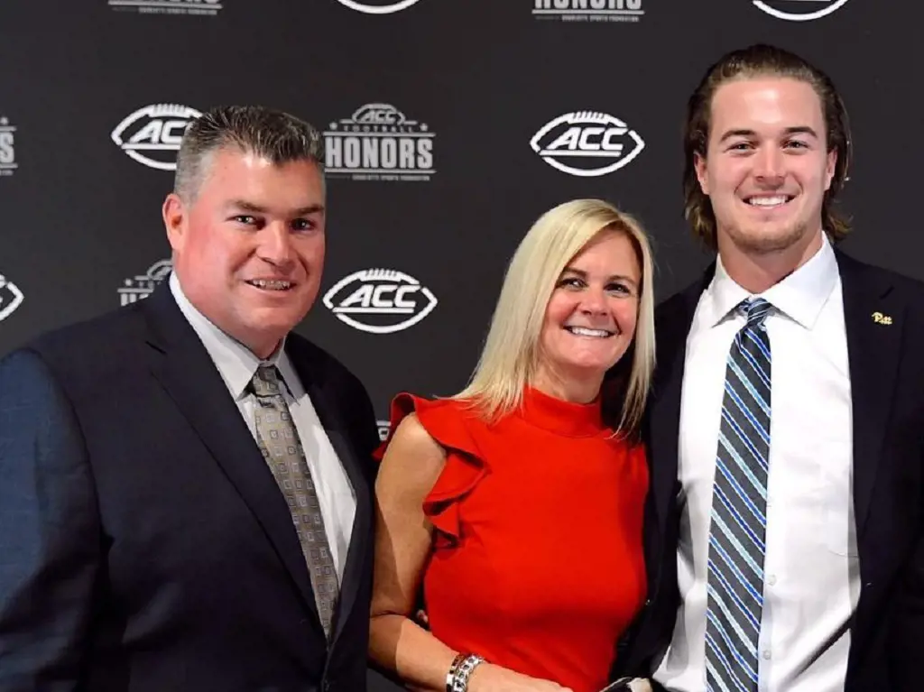 Kenny with his father and mother at Charlotte, North Carolina. 